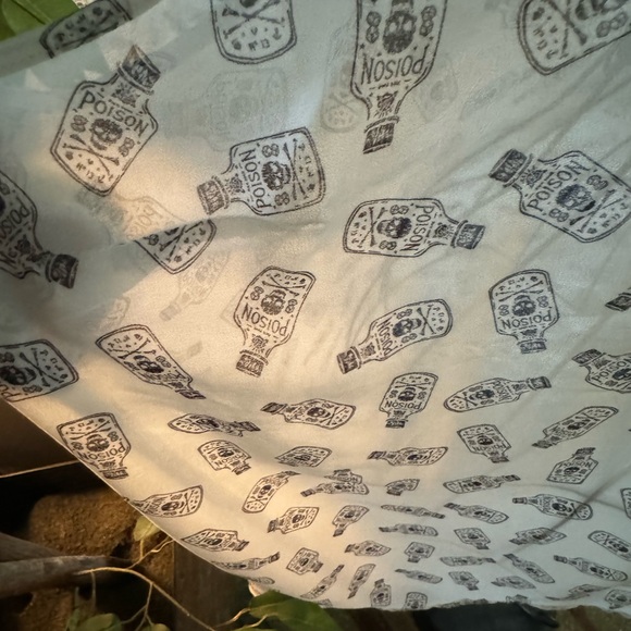 Torrid Hi-Lo Chiffon Skull/Poison Bottle Sleeveless Top - Picture 4 of 7